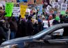 Demonstrators against the ongoing Immigration and Customs Enforcement deployment during a protest at the Government Plaza in Minneapolis on Sunday, Jan. 25, 2026.