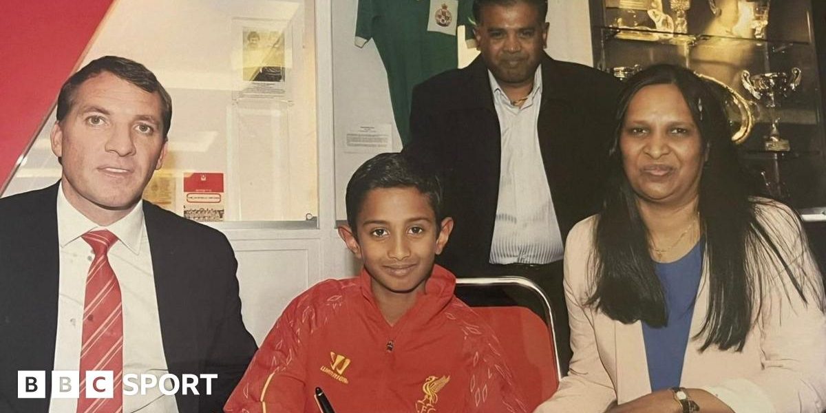 Vimal Yoganathan alongside Brendan Rodgers when he signed for the academy at Liverpool