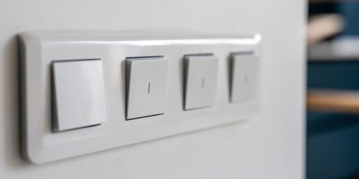 four-light-switches-macro-with-bokeh-background-minimal-design-scaled.jpg - RevistaPolitica