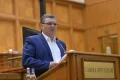 Dumitru Coarnă, fost deputat, lansează critici dure la adresa politicilor economice atribuite lui Ilie Bolojan, acuzându-l de contribuție la recesiunea economică și la sărăcia din România