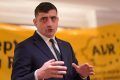 Divergențe majore în AUR privind strategia de guvernare Lideri importanți din cadrul Alianței pentru Unirea Românilor (AUR) au expus public viziuni distincte față de direcția politică promovată de George Simion